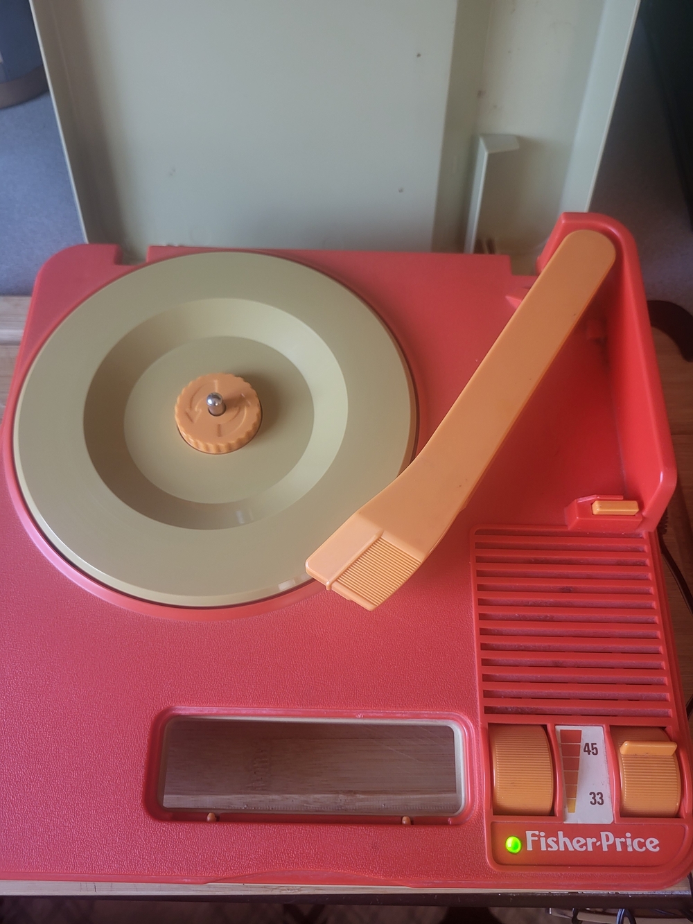 Fisher-Price Red and Cream Portable Record Player with Orange Arm